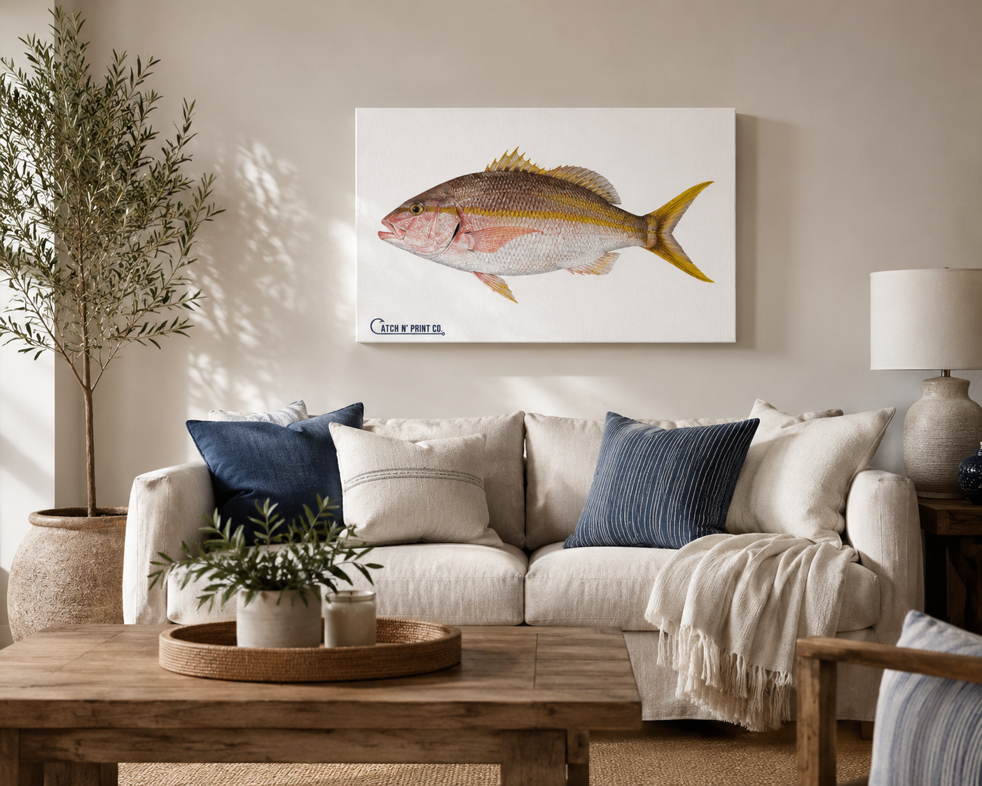 Custom yellowtail snapper canvas print hung above a sofa
