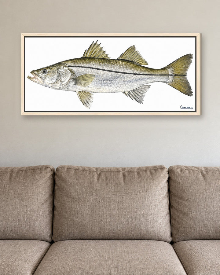 0.75in canvas in a Maple Wood floating frame, at true size above a sofa