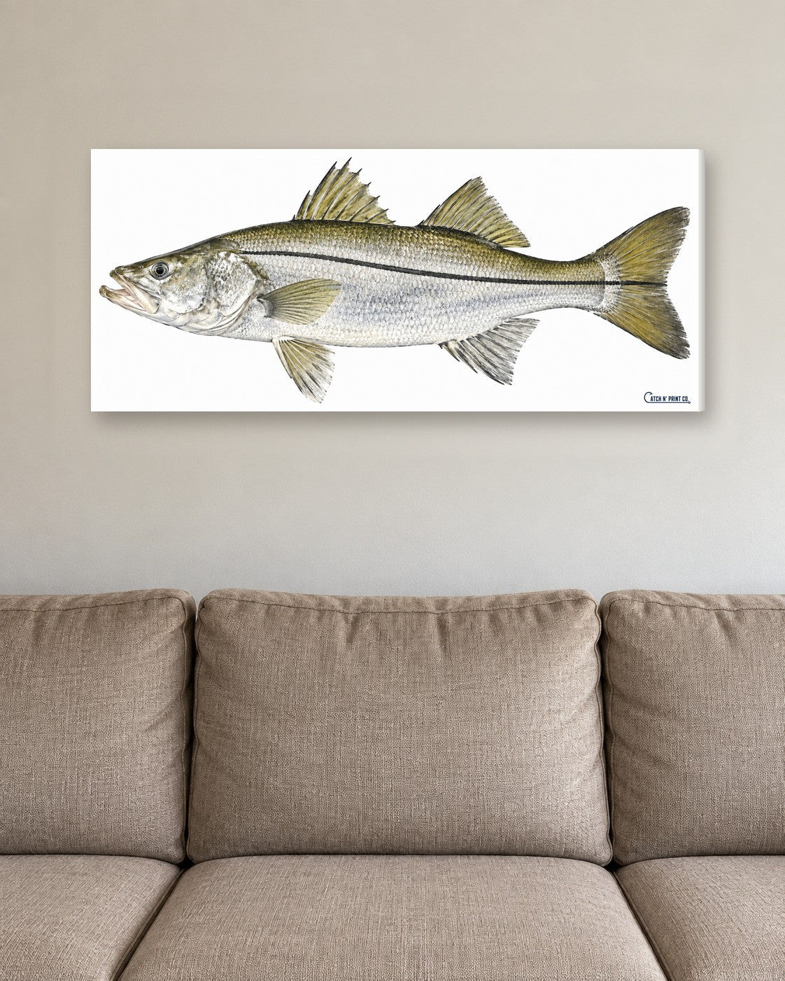 0.75in stretched canvas at true size above a sofa