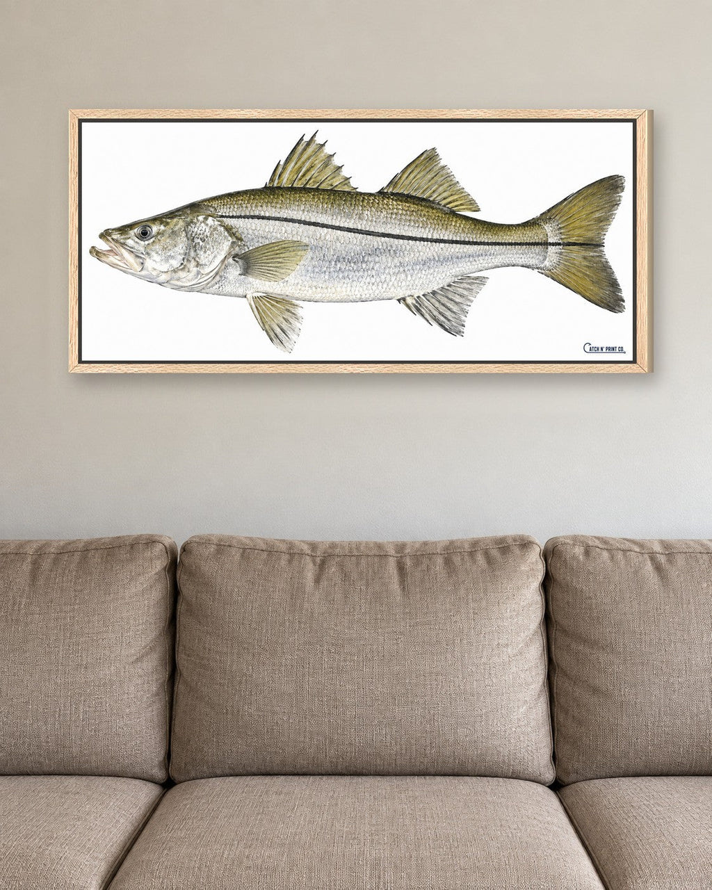 0.75in canvas in a Oak floating frame, at true size above a sofa