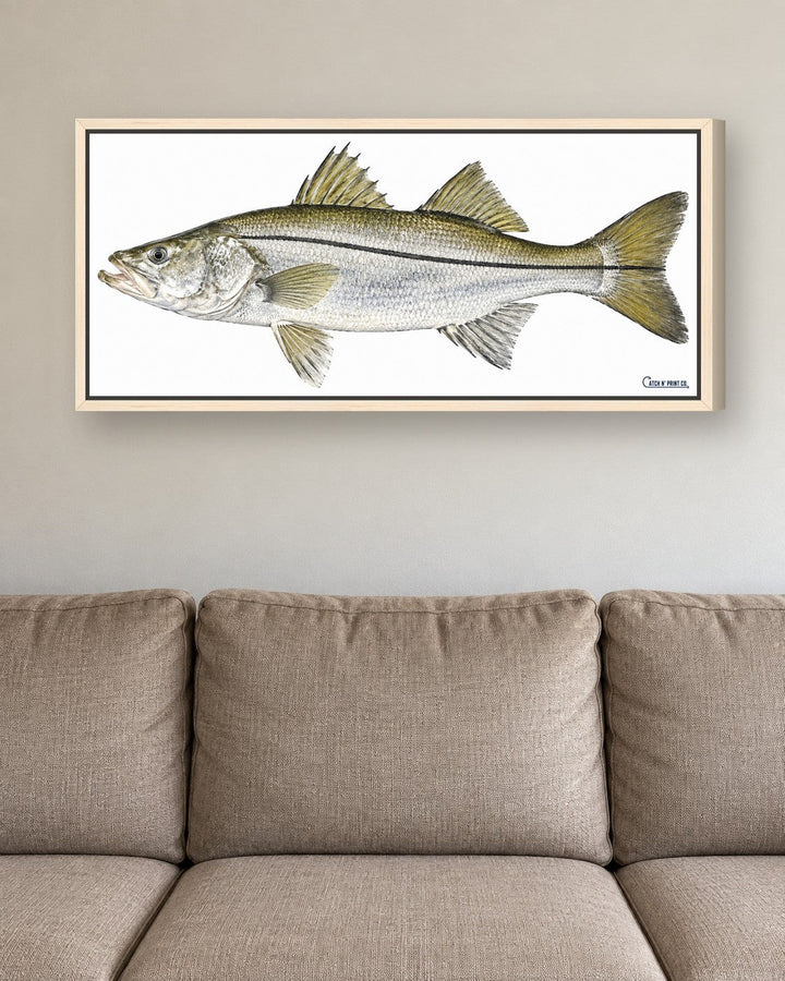 1.50in canvas in a Maple Wood floating frame, at true size above a sofa