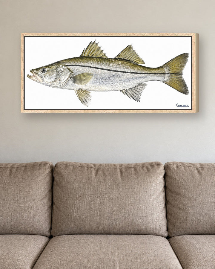 1.50in canvas in a Oak floating frame, at true size above a sofa